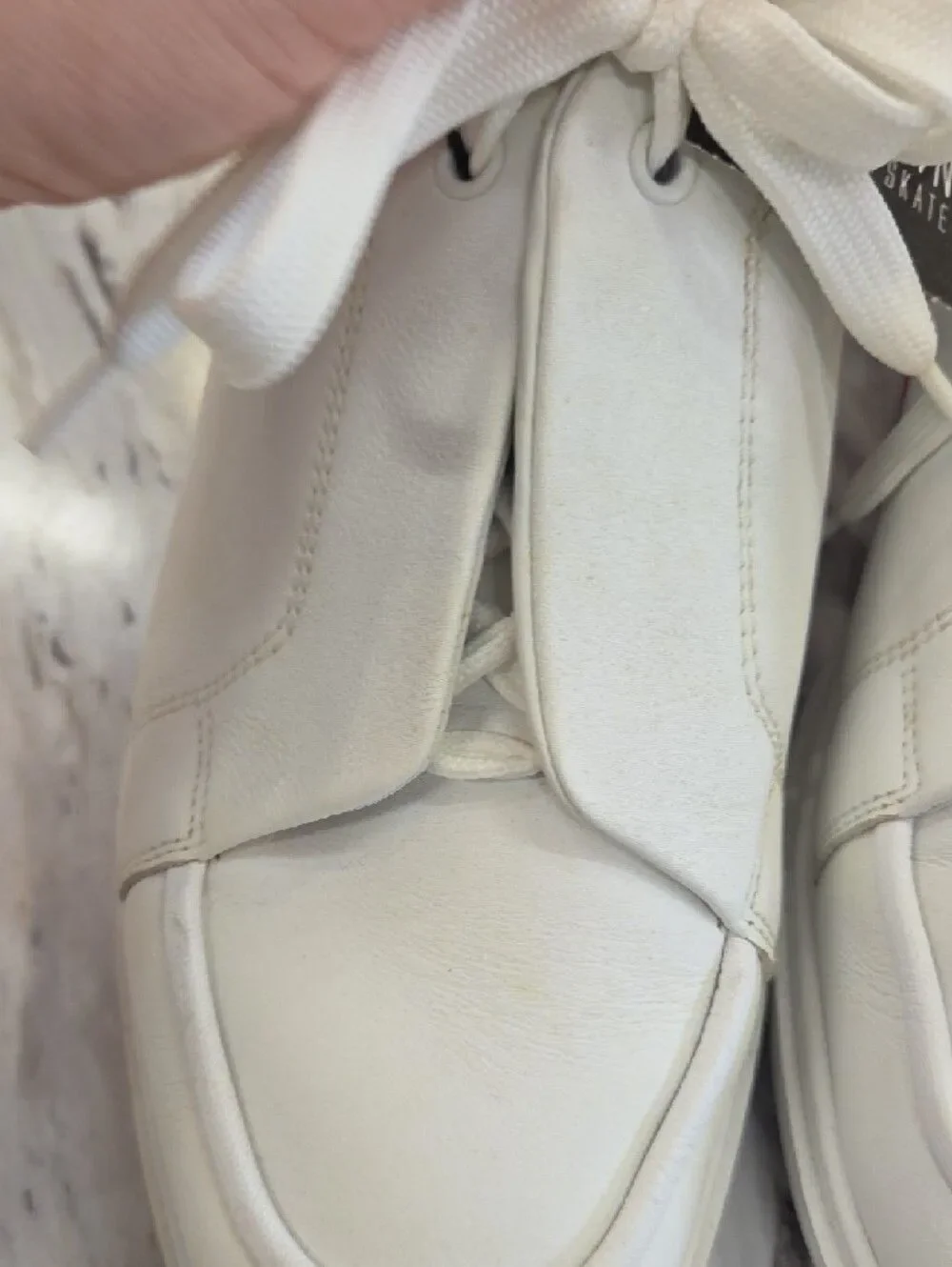 Christian Louboutin White Low-Top Leather Sneakers with Red Heel Accent